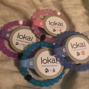 Set of 4 Lokai bracelets.